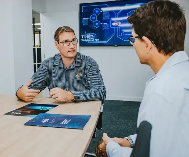ADITS-member-talking-to-client
