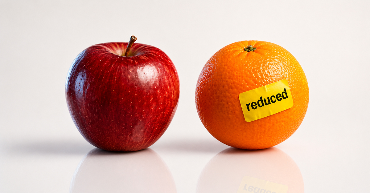 visual representation of “different product with a lower price tag”. Apple next to an orange. Orange has a yellow “REDUCED” fruit sticker on it